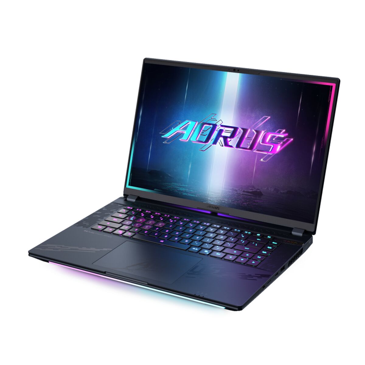 The tecwheels Gigabyte Aorus Master 16 Bzhc6Pte64Sp laptop with Intel Core Ultra 9 275HX, NVIDIA GeForce RTX 5090, 32GB RAM, and 1TB SSD features a black design, colorful backlit keyboard, glowing edges, and neon "AORUS" display.